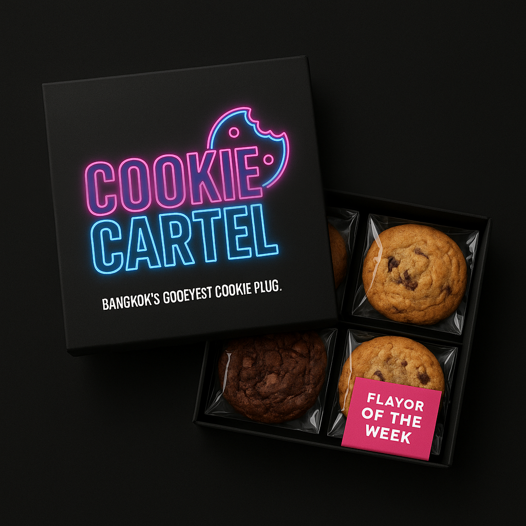 Open Cookie Cartel box with 4 cookies